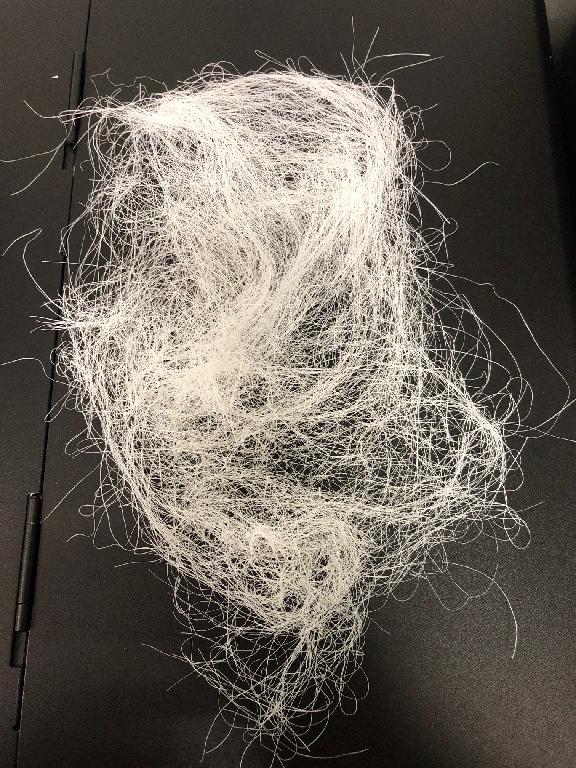 Filato testurizzato di filamenti di nylon. Trattasi di multifilamento ottenuto per filatura in parallelo (non ritorto) con titolo di tenacità inferiore a 50 Tex.
Il filato è destinato alla produzione di tessuti.
L'articolo non è condizionato per la vendita al minuto e si presenta in balle o in sacconi.