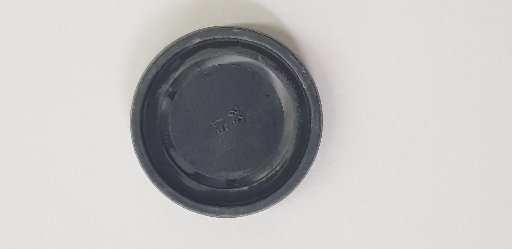 Flapper Valve anti Reflux. Product of Cardinal Health Part Number: 66-3490. Black round flapper valve having a diameter of approximately 2.5cm

As per information provided, the flapper valve is assembled in the non-return valve that is connected to one end of the Tandem Tube (non-sterile)(Not part of this BTI).
The flapper valve anti reflux is the component which provides a uni-directional flow of the fluids that are sucked during operation at the tandem tube Part No: 2-620CE.
The flapper valve is made up of Polyisoprene.
