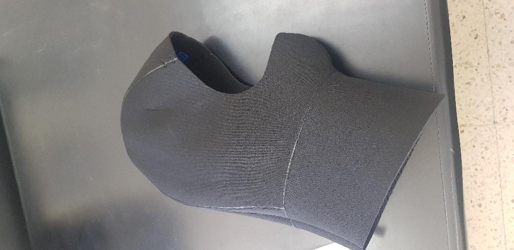 As per sample and description provided - A hood made of 3mm neoprene and covered on both sides with nylon knitted textile material. 
It covers the head, nose & mouth and part of neck
Used for diving activities