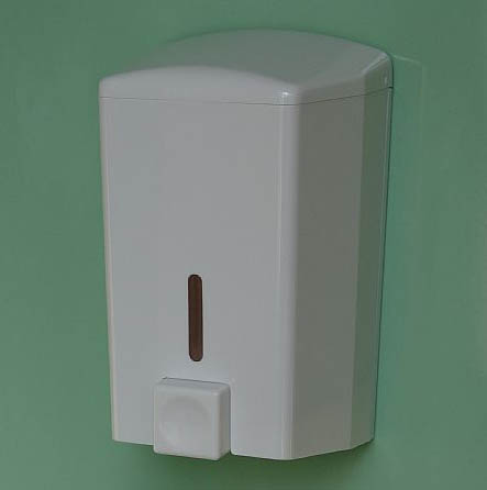 A housing container made of plastic or steel which incorporates a simple suction pump and a dispenser opening.  The pump is activated by manual pushing at the bottom of housing. Once the button is presses, the liquid soap is dispersed through the opening at the bottom.  Designed to be fixed to a wall.  Its is commonly used in bathrooms and kitchens