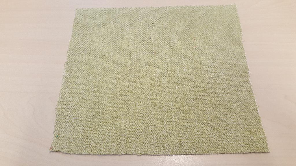 Een inslagfluweel met -volgens opgave- onder andere de volgende kenmerken:
- bestaande uit 2 op elkaar geplakte lagen;
- een onderlaag van textielvlies;
- een bovenlaag van weefsel met een gesneden pool;
- bestemd voor meubelstoffering;
- vervaardigd van synthetische of kunstmatige vezels (polyester);
Het product wordt aangeboden op rollen.