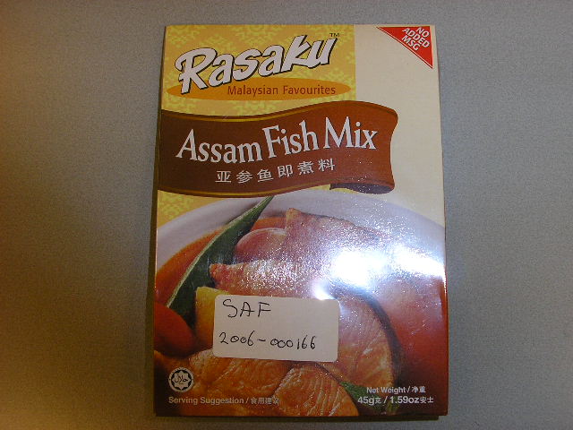 "Assam Fish Mix", een preparaat voor het bereiden van een saus. Het product, verpakt in een zakje van aluminiumfolie dat wordt aangeboden voor de verkoop in het klein in een kartonnen doosje met een netto-inhoud van ongeveer 45 gram en bevat onder andere de volgende ingrediënten:
- koriander;
- citroenzuur;
- suiker;
- zout;
- chili;
- gistextract (van melasse).