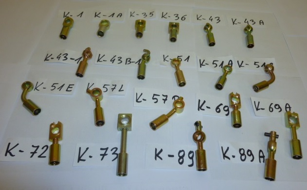 Złączki przewodów rurowych o symbolach: „K-1”, „K-1A”, „K-35”, „K36”, „K-43”, „K-43A”, „K-43B”, „K-43B-1”, „K-43-1”, „K-51”, „K-51A”, „K-51C”, „K-51E”, „K-57L”, „K-57P”, „K-69”, „K-69A”, „K-72”, „K-73”, „K-89”, „K-89A”, „K-93A”, „K-93B”, „K-96”, „K-111”, „K-115”, „K-118”, „K-125”, „K-126”, „K-128”, „K-145”, „K-147”, „K-148”, „K-161”, „K-162”, „K-166”, „K-167”, „K-169”, „K-171L”, „K-171P”, „K-172L”, „K-172P”, „K-173L”, „K-173P”, „K-174”, „K-184”, „K-185”, „K-186”, „K-188”, „K-190”, „K-191”, „K-192”, „K-193”, „K-196L”, „K-196P”, „K-197”, „K-213”, „K-226”, „K-227”, „K-232”, wykonane są przez obróbkę wiórową ze stali Q235, ocynkowane, pokryte pasywacją żółtą. Posiadają one prosty lub kątowy kształt. Z jednej strony zakończone są tulejką, wewnątrz której znajduje się koncentrycznie położona cienka okrągła rurka. Z drugiej strony mają końcówkę oczkową. Kształt wewnętrzny końcówek oczkowych jest okrągły, a zewnętrzny może  być okrągły, prostokątny, okrągły ścięty itp. Zakończenia oczkowe mogą posiadać zaczepy stabilizujące. Złączki przewodów są przelotowe (umożliwiają przepływ czynnika). Orientacyjne wymiary wyrobów wynoszą od kilku do kilkunastu cm. Wyroby są przeznaczone do zaciskowego zamocowania na końcu elastycznego przewodu hamulcowego pojazdu samochodowego, umożliwiają połączenie tego przewodu z zaciskiem hamulcowym.