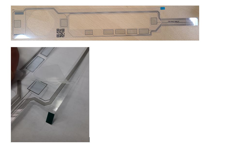 Wyroby wykonane z samoprzylepnej folii (inlay touch), przeznaczone do panelu sterującego pralek. Zawierają jednowarstwowe obwody drukowane w postaci ścieżek przewodzących oraz złącza. Nie posiadają elementów elektronicznych pasywnych i aktywnych, ani elementów mechanicznych. Ścieżki przewodzące wykonane zostały ze srebra. Atramentem polimerowym PEDOT zaznaczono miejsca montażu przycisków. Całość zabezpieczona jest folią ochronną. Skład wyrobu: PET 50% /Ink 20% /OCA Tape (Optically Clear Adhesives) 25% (płynny, przezroczysty klej) / Stiffener (usztywniacz) 5%.