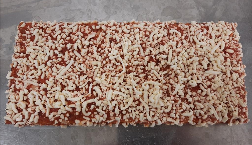 Varan är en beredd livsmedelsberedning tillverkad av mjöl i form av en fryst pizza, bestående av en förgräddad pizzabotten med tomatbaserad sås som är toppad med riven ost. Föreligger om 8 st. bitar à 50 g i detaljhandelsförpackning om 400 g.
Den förgräddade degbotten innehåller enligt uppgift mjöl, vatten, rapsolja, havremjöl, socker, torrjäst och salt. Såsen innehåller vatten, tomatpuré, rapsolja, socker, salt, modifierad potatisstärkelse, oregano, vitlök, vitpeppar och basilika. Varan är toppad med riven gratängost.