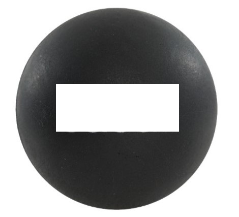 Massageboll (trigger ball) med ostrukturerad yta enligt uppgift tillverkad av naturgummi. Bollen har en diameter av 6 cm.
Bollen används för att trycka ut muskelknutor och komma åt trigger punkter.
Massagebollen är förpackad för försäljning i detaljhandeln.
