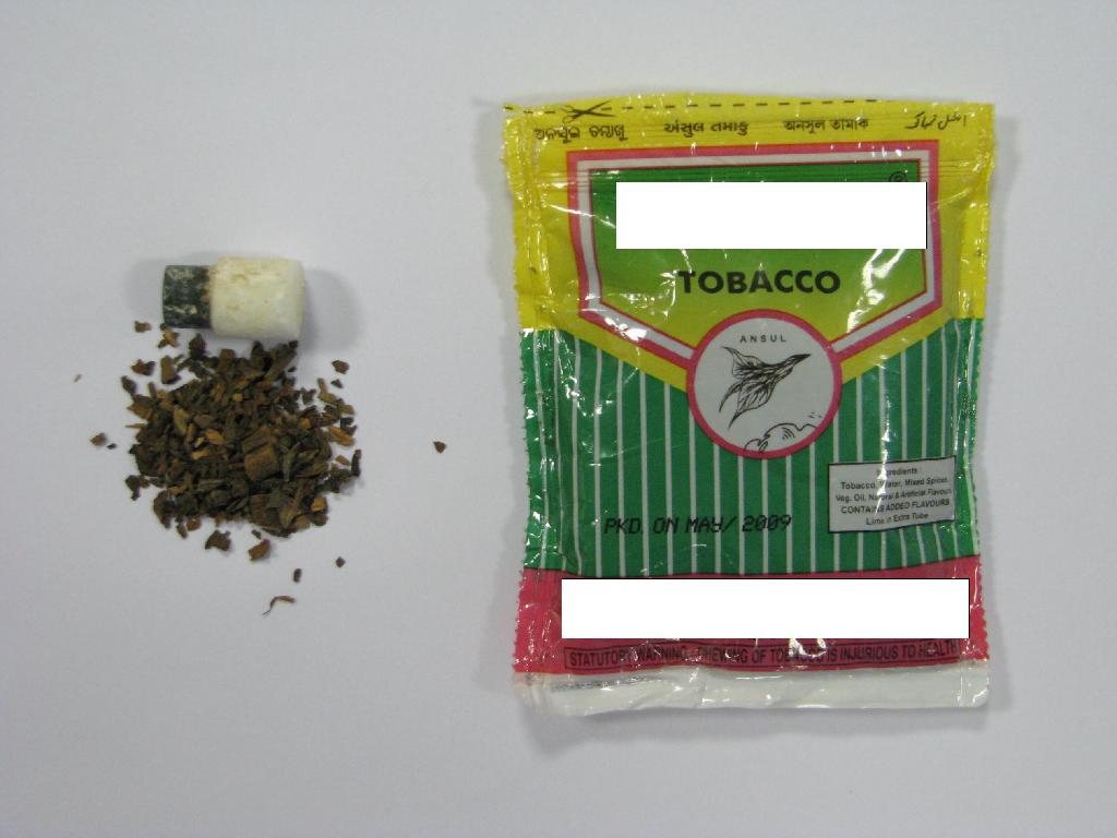 Tobak za žvečenje, pakiran v zavitke po 11 g. Osnovne sestavine so posušen narezan tobak, voda, mešanica začimb, rastlinsko olje ter naravne in umetne arome. Citronka v prahu je priložena v ločeni plastenki.