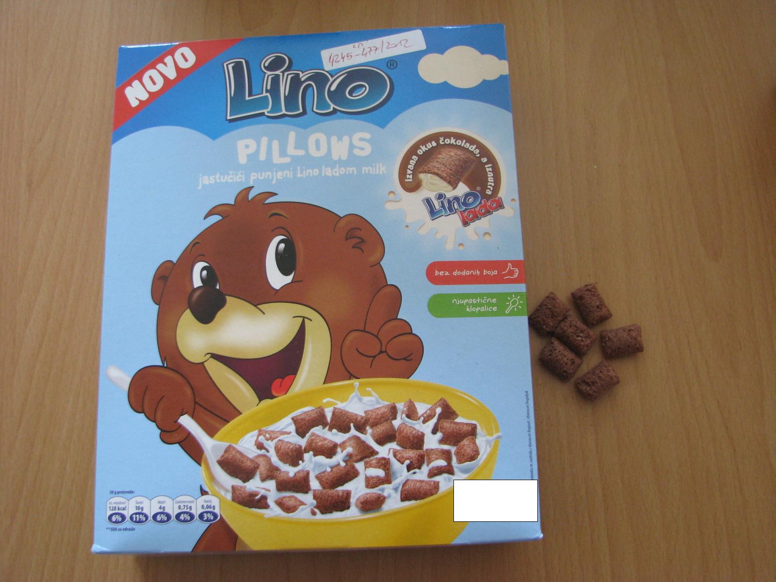 Pripravljeno živilo, dobljeno z nabrekanjem žitnih proizvodov, v obliki hrustljavih blazinic temno rjave barve, dimenzije 2 x 1,5 cm in polnjenih z mlečno kremnim namazom.
Osnovne sestavine so pšenična in riževa moka, sladkor, kakavov prah, sol in mlečni kremni namaz.
Živilo vsebuje manj kot 6 mas.% kakava, preračunano na popolnoma odmaščeno osnovo.

Uporablja se kot hrana za zajtrk.

Pakirano v vrečko in nato v kartonsko škatlo po 250 g.