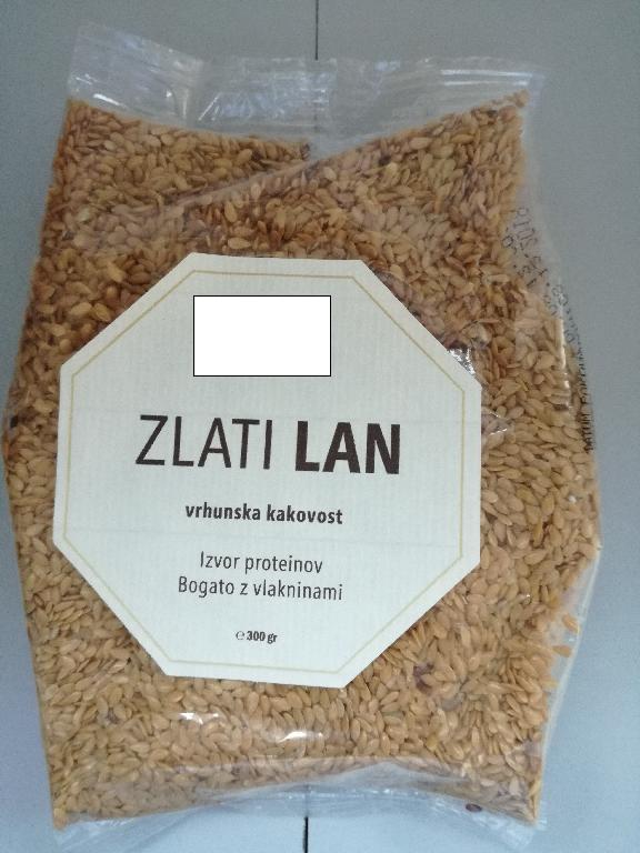 Očiščena, posušena, cela semena zlatega lanu (Linum usitatissimum ), podolgovate oblike, rumeno rjave barve.
Uporablja se za prehrano.
Pakirano v vrečke po 300 g.