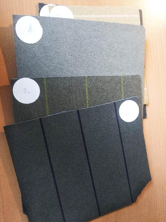 Trecí materiál - kompozitný papier s hrúbkou nepresahujúcou 20 mm, neobsahujúci azbest, určený do výroby pre priemysel, zatiaľ nenamontovaný, určený na polepenie spojkových lamiel.  Trecí materiál sa používa výlučne na výrobné účely. Kompozitný trecí papier je vyrobený z celulózy, pridáva sa do neho latex, karbón, grafit a pri niektorých druhoch aj para amid. Použitie: počítačovo riadený stroj vystrihne podľa naprogramovanej makety konkrétny výstrih z trecieho papiera. Vystrihnuté kusy sa strojovo prilepujú a tvarujú na oceľovej lamele.