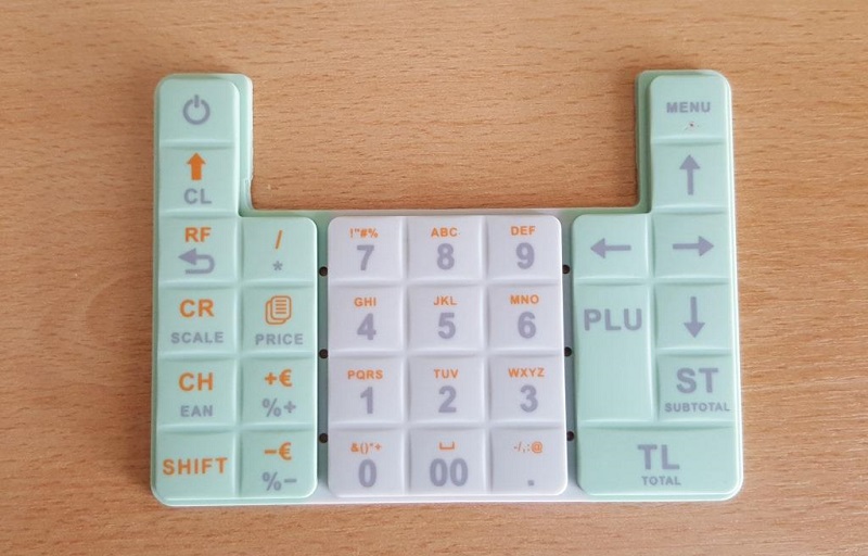 Membrána klávesnice vyrobená zo silikónu bez elektrovodivých prvkov. Výrobok má na jednej strane tvarované klávesy a na druhej strane nevodivé kontaktné kolíky. Tvarované klávesy obsahuju alfanumerickú klávsnicu ako aj iné znaky typické pre registračné pokladnice.
Slúži na ovládenie registračnej pokladnice.