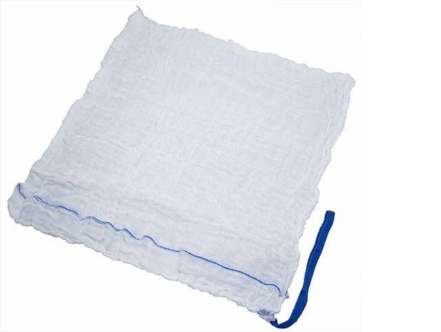 Tampón brušný s RTG vláknom, predpraný. Tampón je vyrobený zo 100% bavlnenej gázy skladanej v štyroch vrstvách do tvaru štvorca s rozmermi 45cm x 45cm. Je mäkký a vysoko savý. Tampón obsahuje RTG vlákno, ktoré slúži na rozlíšenie pod röntgenovým žiaričom. Na jednom rohu tampónu je všitý textilný pásik modrej farby. Okraje jednotlivých vrstiev sú všité dovnútra a pre zvýšenie pevnosti sú prešité. Tampón sa používa na lekárske úkony najmä na operačných  sálach, ale aj pri ambulantných zákrokoch. Tovar je určený na predaj v malom. Dodáva sa balený v počte 100 kusov v priehľadnom plastovom vrecku s etiketou.